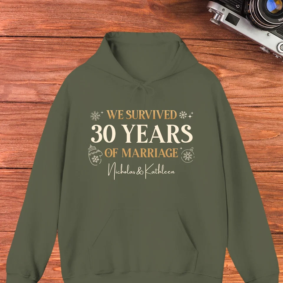 We Survived Many Years Of Marriage In Christmas Theme - Personalized Gift For Couples - Unisex Hoodie