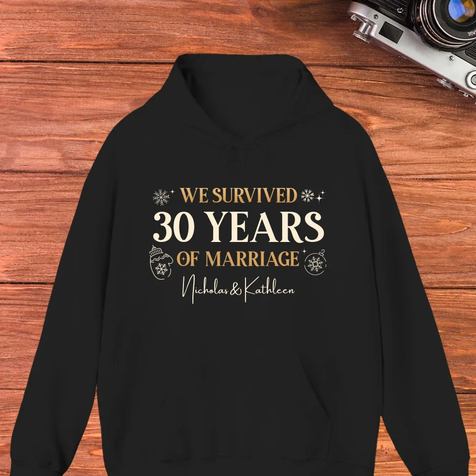 We Survived Many Years Of Marriage In Christmas Theme - Personalized Gift For Couples - Unisex Hoodie