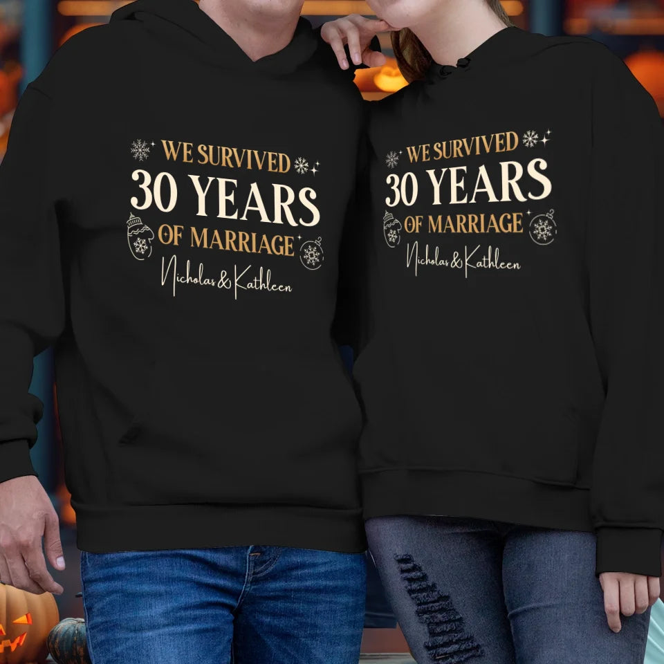 We Survived Many Years Of Marriage In Christmas Theme - Personalized Gift For Couples - Unisex Hoodie