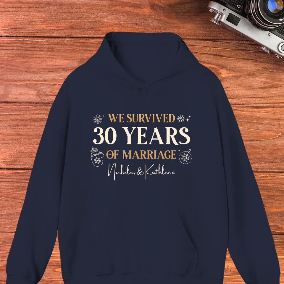 We Survived Many Years Of Marriage In Christmas Theme - Personalized Gift For Couples - Unisex Hoodie