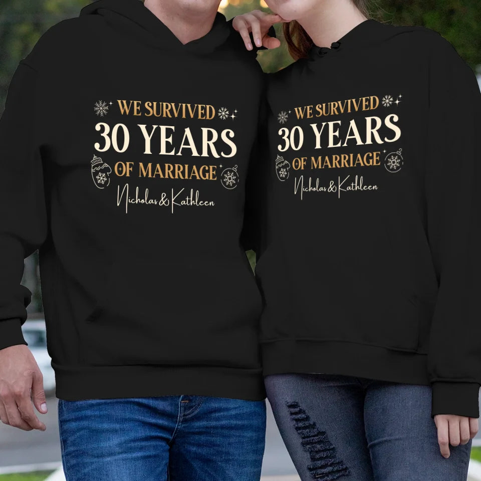 We Survived Many Years Of Marriage In Christmas Theme - Personalized Gift For Couples - Unisex Hoodie