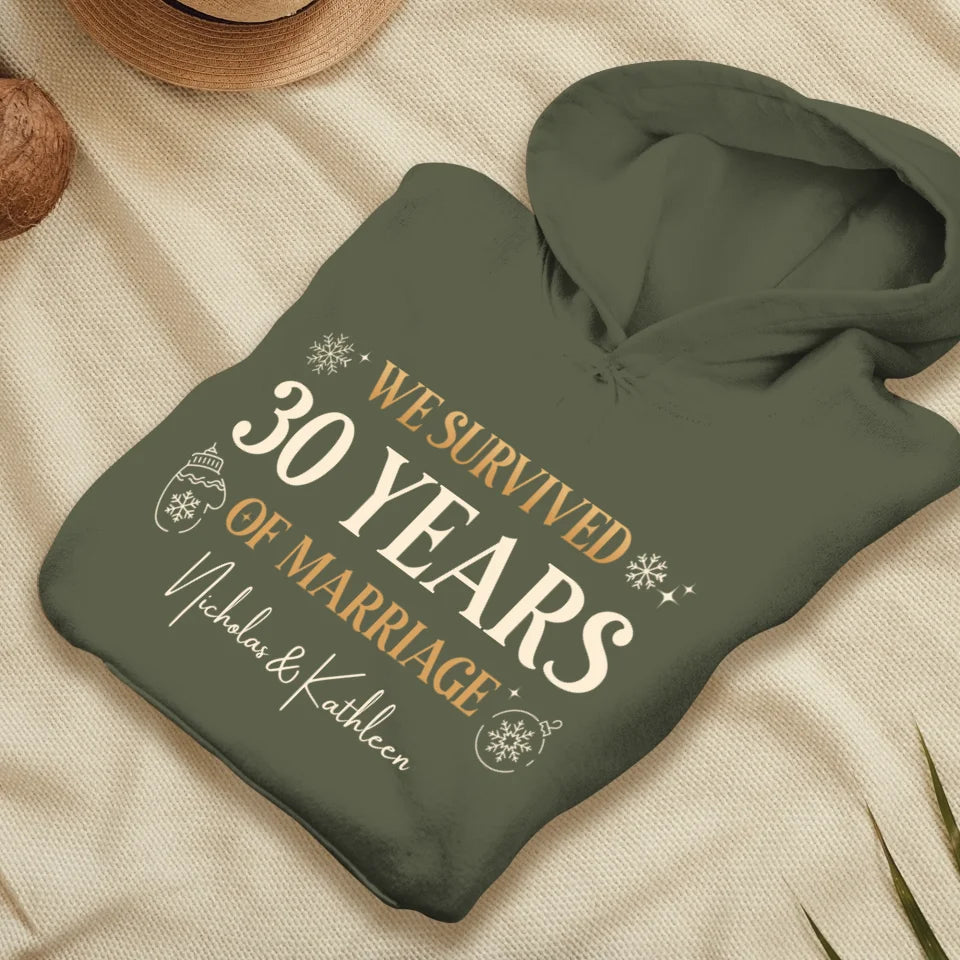 We Survived Many Years Of Marriage In Christmas Theme - Personalized Gift For Couples - Unisex Hoodie