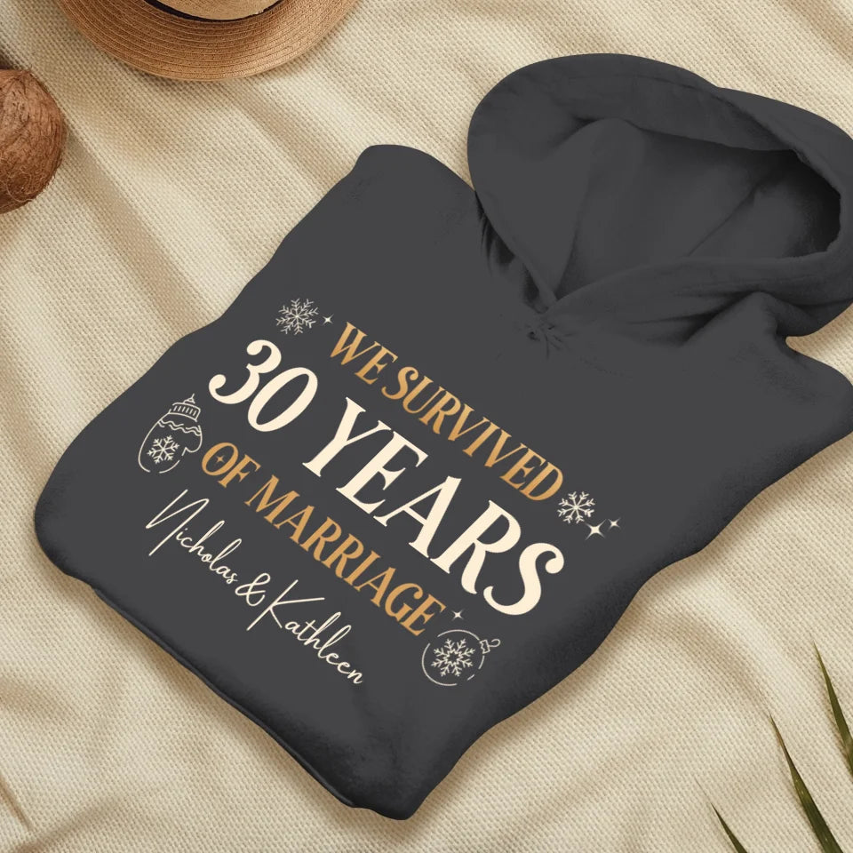 We Survived Many Years Of Marriage In Christmas Theme - Personalized Gift For Couples - Unisex Hoodie