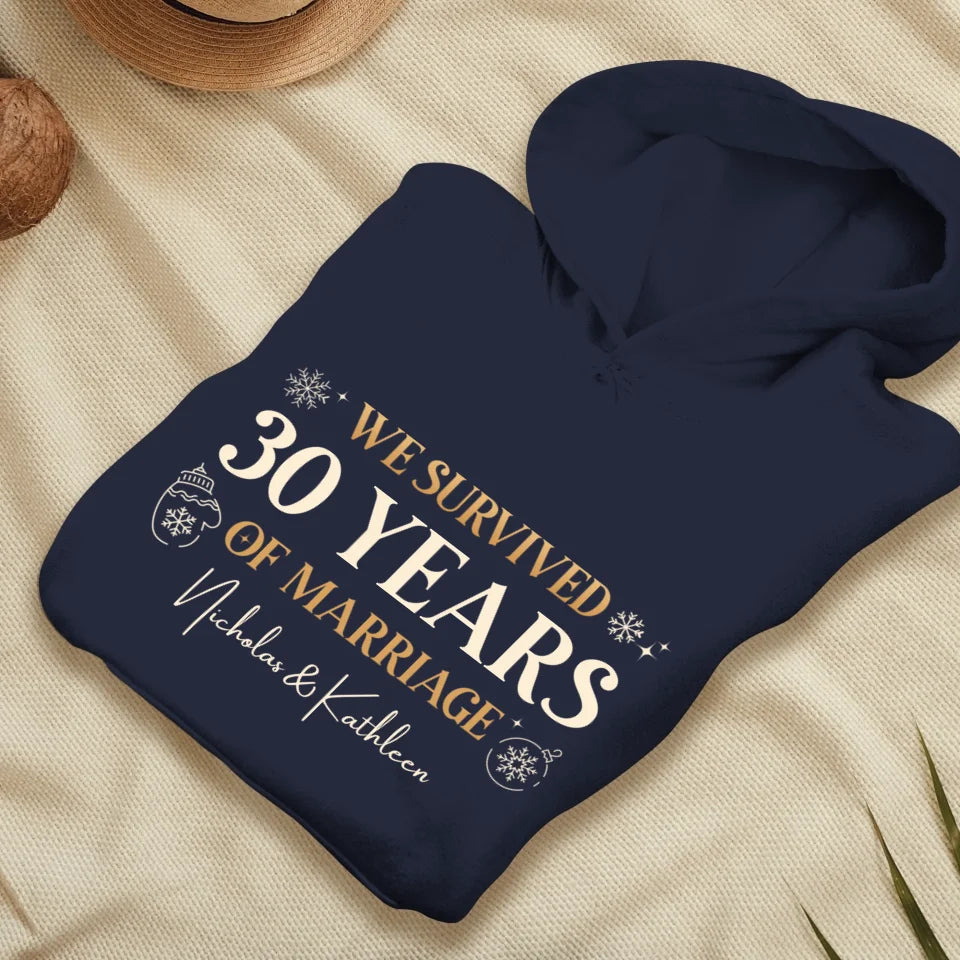 We Survived Many Years Of Marriage In Christmas Theme - Personalized Gift For Couples - Unisex Hoodie