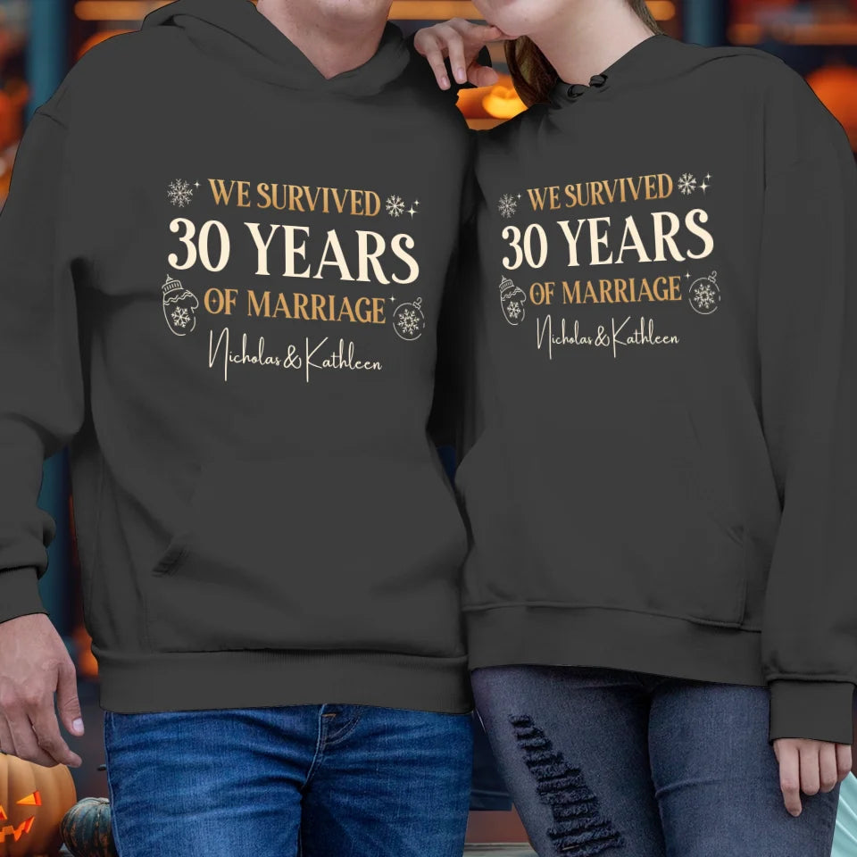 We Survived Many Years Of Marriage In Christmas Theme - Personalized Gift For Couples - Unisex Hoodie