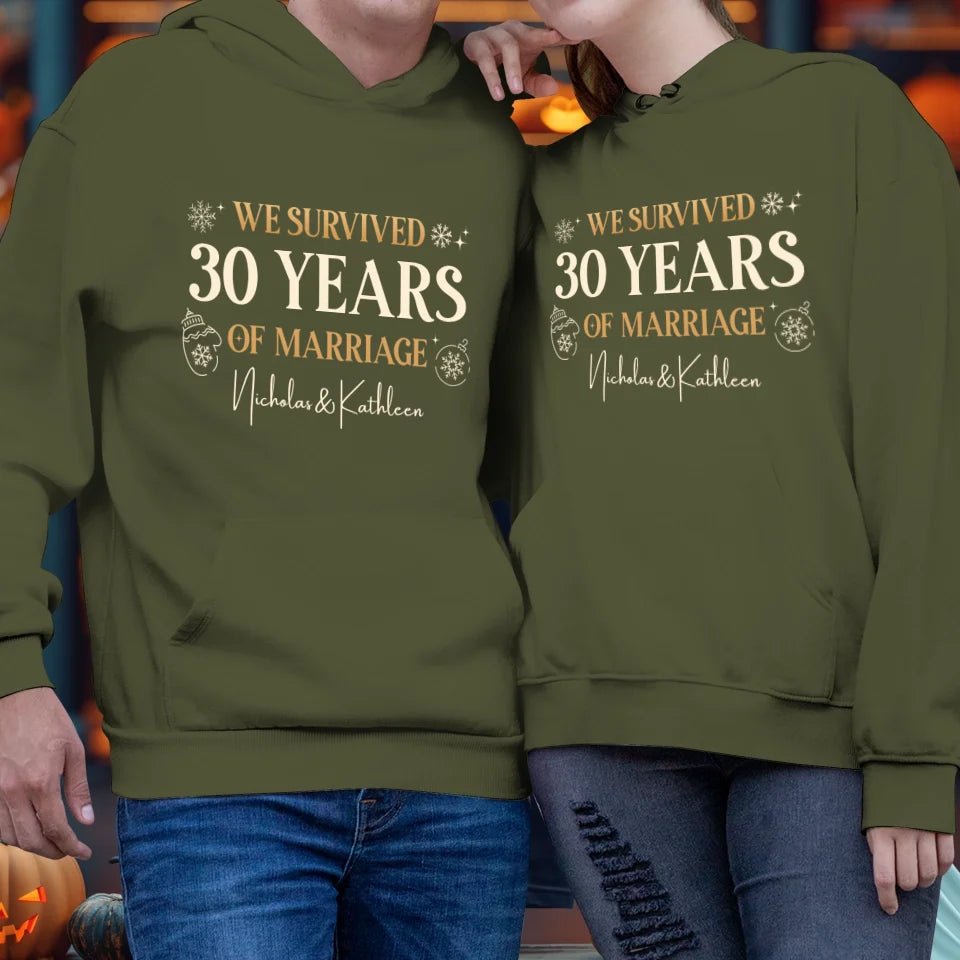 We Survived Many Years Of Marriage In Christmas Theme - Personalized Gift For Couples - Unisex Hoodie