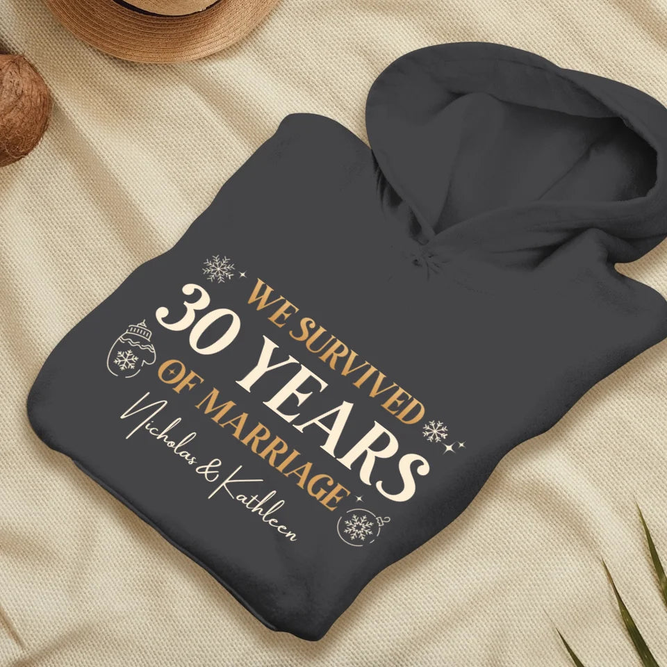 We Survived Many Years Of Marriage In Christmas Theme - Personalized Gift For Couples - Unisex Hoodie