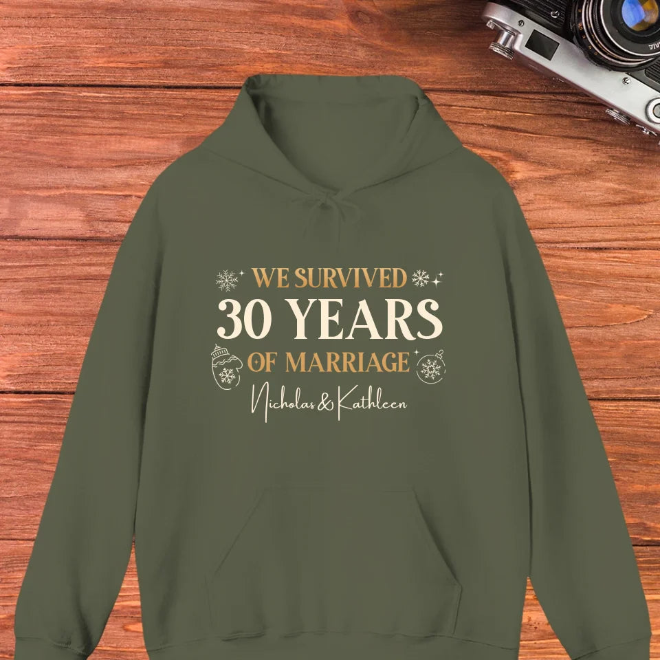 We Survived Many Years Of Marriage In Christmas Theme - Personalized Gift For Couples - Unisex Hoodie