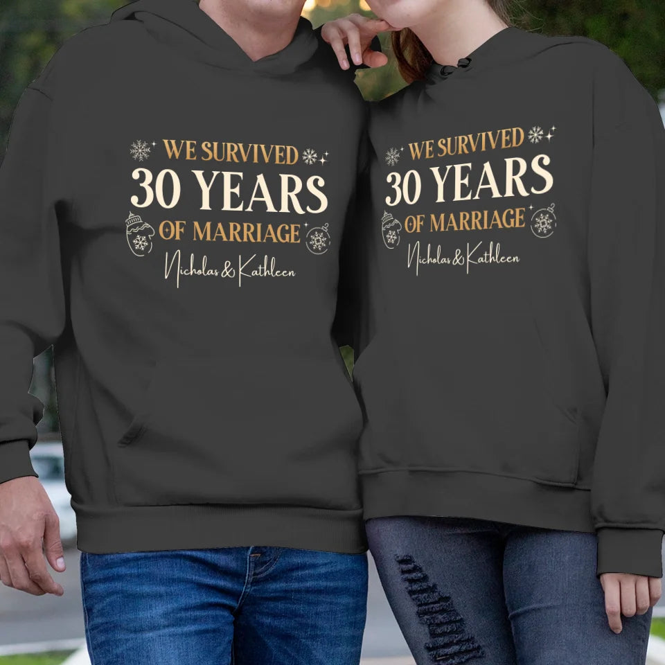 We Survived Many Years Of Marriage In Christmas Theme - Personalized Gift For Couples - Unisex Hoodie