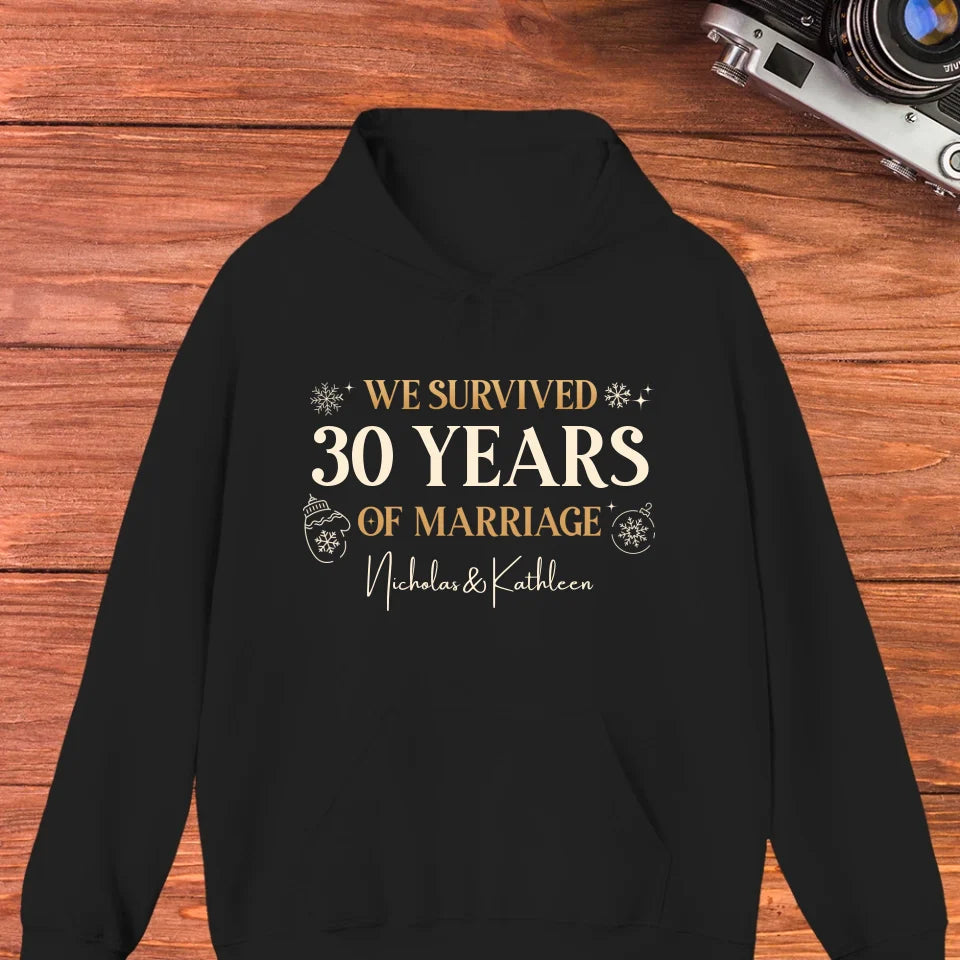 We Survived Many Years Of Marriage In Christmas Theme - Personalized Gift For Couples - Unisex Hoodie