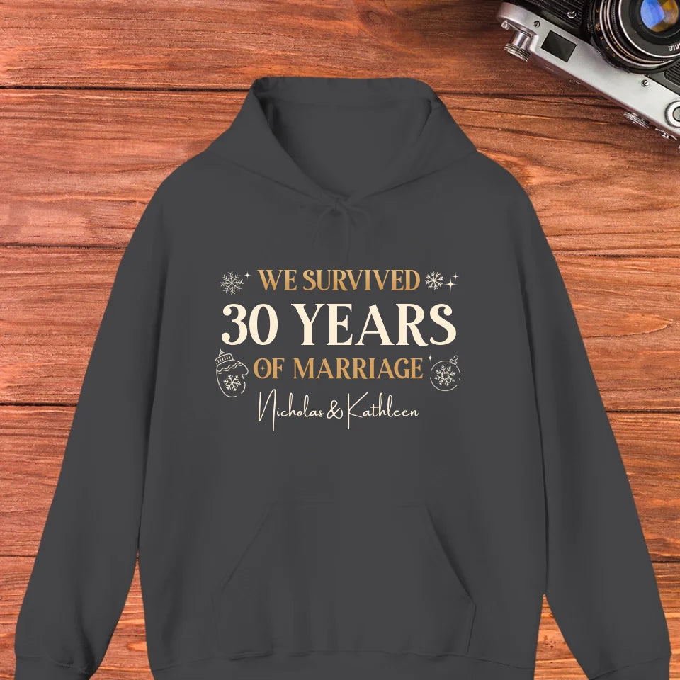 We Survived Many Years Of Marriage In Christmas Theme - Personalized Gift For Couples - Unisex Hoodie